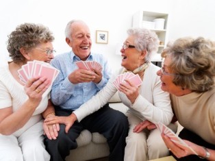Group of Elderly Playing Cards